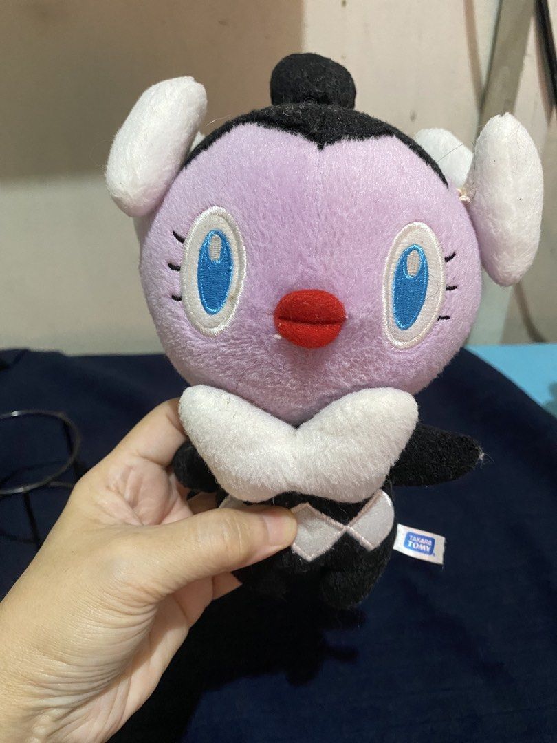 Takara Tomy Pokémon Gothita Plush (Category: Plushies & Soft Toys) located in Manila. Submitted by resi.diaz (Listing ID 1467000002, Image 2). Description: - Official Takara Tomy Pokémon Gothita plush toy - Features a purple head, black body with a diamond pattern on the back, and white collar and ear tufts - Authentic tag attached at the back - Condition: Minor lint collection from display, otherwise well-kept - Perfect addition for Pokémon plus