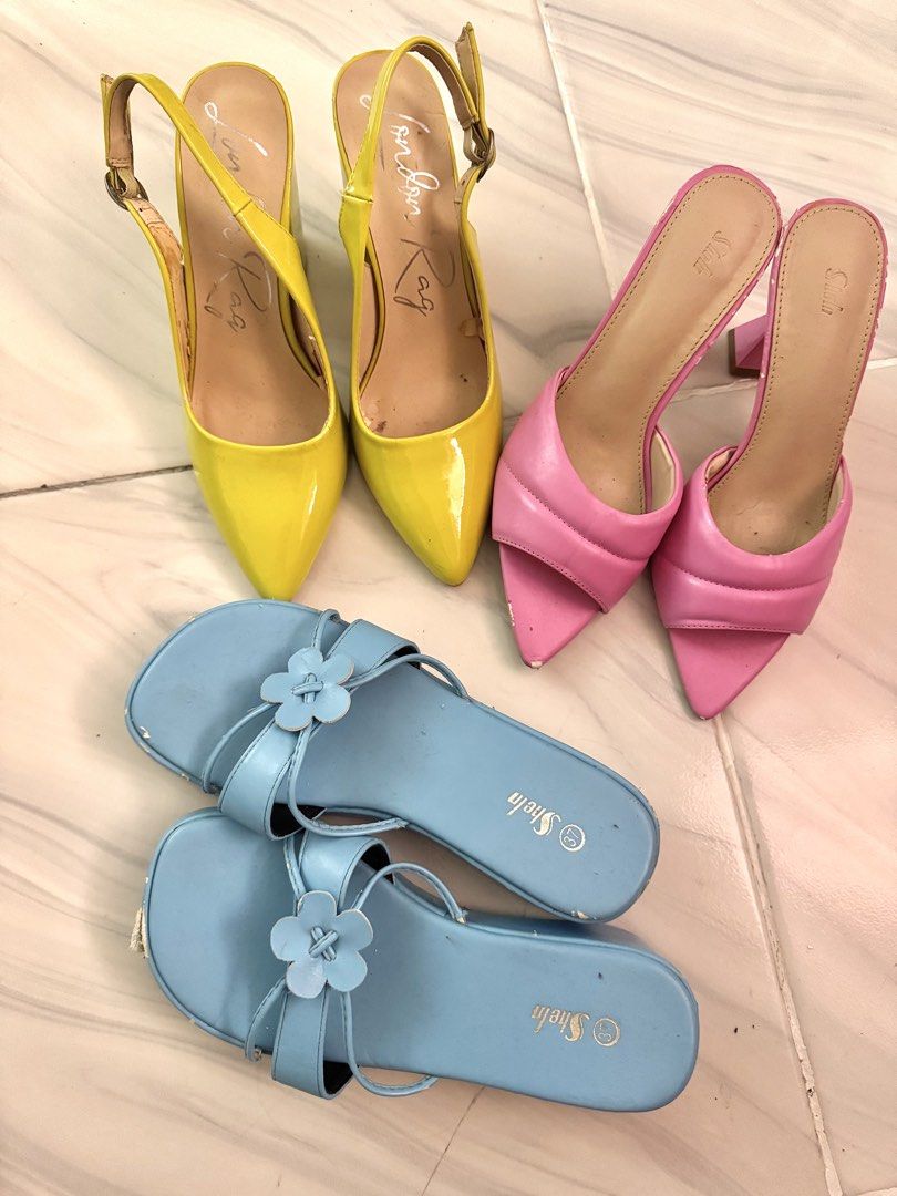 TAKE ALL 3 HEELS (Category: Heels) located in Bulacan. Submitted by archivesbyjanine (Listing ID 1467009142, Image 1). Description: All size 7 Pink - may mga bakbak Green - sa loob lang ang bakbak Blue, may bakbak sa front Wearable pa naman sila.