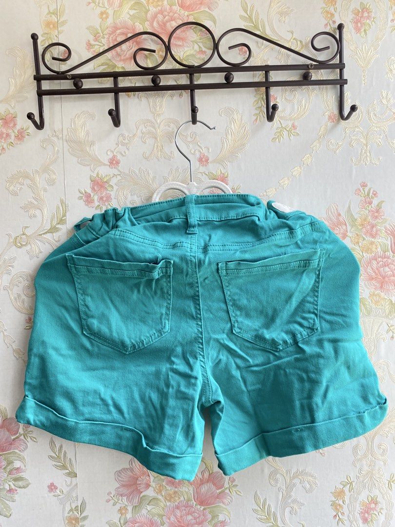 Teal Denim Cuffed Shorts (Category: Shorts) located in Bulacan. Submitted by str4wberryjj (Listing ID 1467109513, Image 2). Description: - Brand: Celebrity Pink - Color: Vibrant teal green - Style: Mid-rise denim shorts with cute ruffled elastic waistband - Details: Front scoop pockets, back patch pockets, button closure, and cuffed hems - Condition: Great pre-loved condition - Perfect for: Warm weather outfits, easily paired with basic tanks and