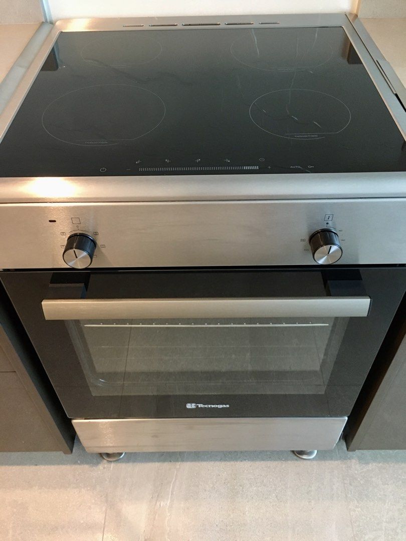 Tecnogas Electric Induction Cooking Range (Category: Ovens & Toasters) located in Makati City. Submitted by savedeal (Listing ID 1467007666, Image 1). Description: Tecnogas TFI6004FRX 60cm Electric Cooking Range Excellent Condition (Like New) - rarely used Pick-up in Rockwell Power Plant Mall Dimensions: L 61 x W 60 x H 83 (cm) KEY FEATURES 60cm Electric Cooking Range 4 Induction Zones Sensor Touch Controls with Safety Lock Individual Residual He