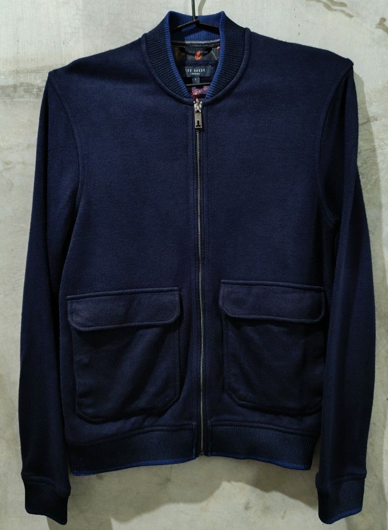 Ted Baker Mens Navy Blue Double Front Pocket Bomber Jacket (Category: Coats, Jackets and Outerwear) located in Bacoor. Submitted by nineties_kid (Listing ID 1467055652, Image 2). Description: Ted Baker Mens Navy Blue Double Front Pocket Bomber Jacket Size: Extra Small (fits small also) Shoulder width: 17 inches Sleeve length: 25 inches Jacket width: 19 inches (Armpit-armpit) Jacket length: 26.5 inches _________________________ -Modes Of Delivery: