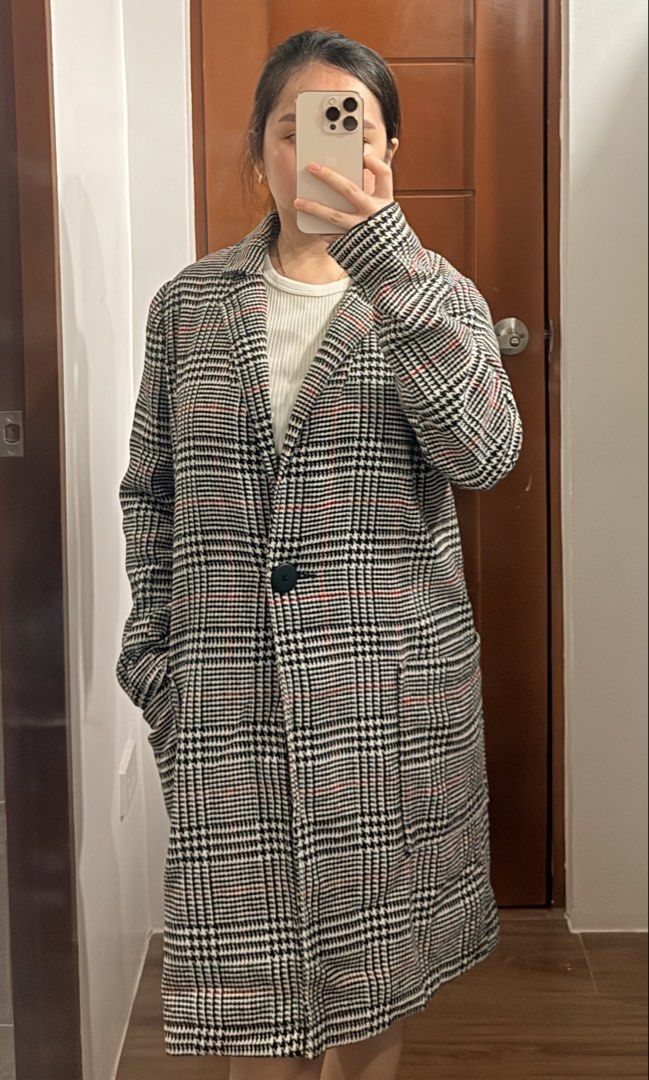 Terranova Plaid Long Coat (Category: Coats, Jackets and Outerwear) located in Santa Rosa. Submitted by cmasangkay (Listing ID 1467054938, Image 2). Description: - Brand: Terranova - Style: Outerwear coat in classic black and white plaid with subtle red stripes - Closure: Single button front - Pockets: Deep side pockets for convenience - Interior: Fully lined for comfort - Measurements: Length ~86 cm, Sleeve ~26 cm - Condition: Great layering piec