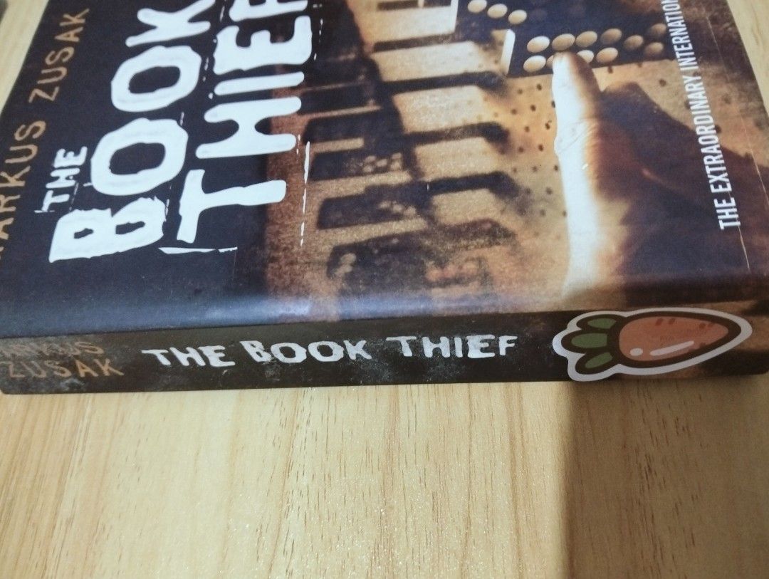 The Book Thief (Category: Storybooks) located in Manila. Submitted by rinne05 (Listing ID 1467091314, Image 3). Description: Bought from Fully Booked. Has a carrot sticker on the spine..