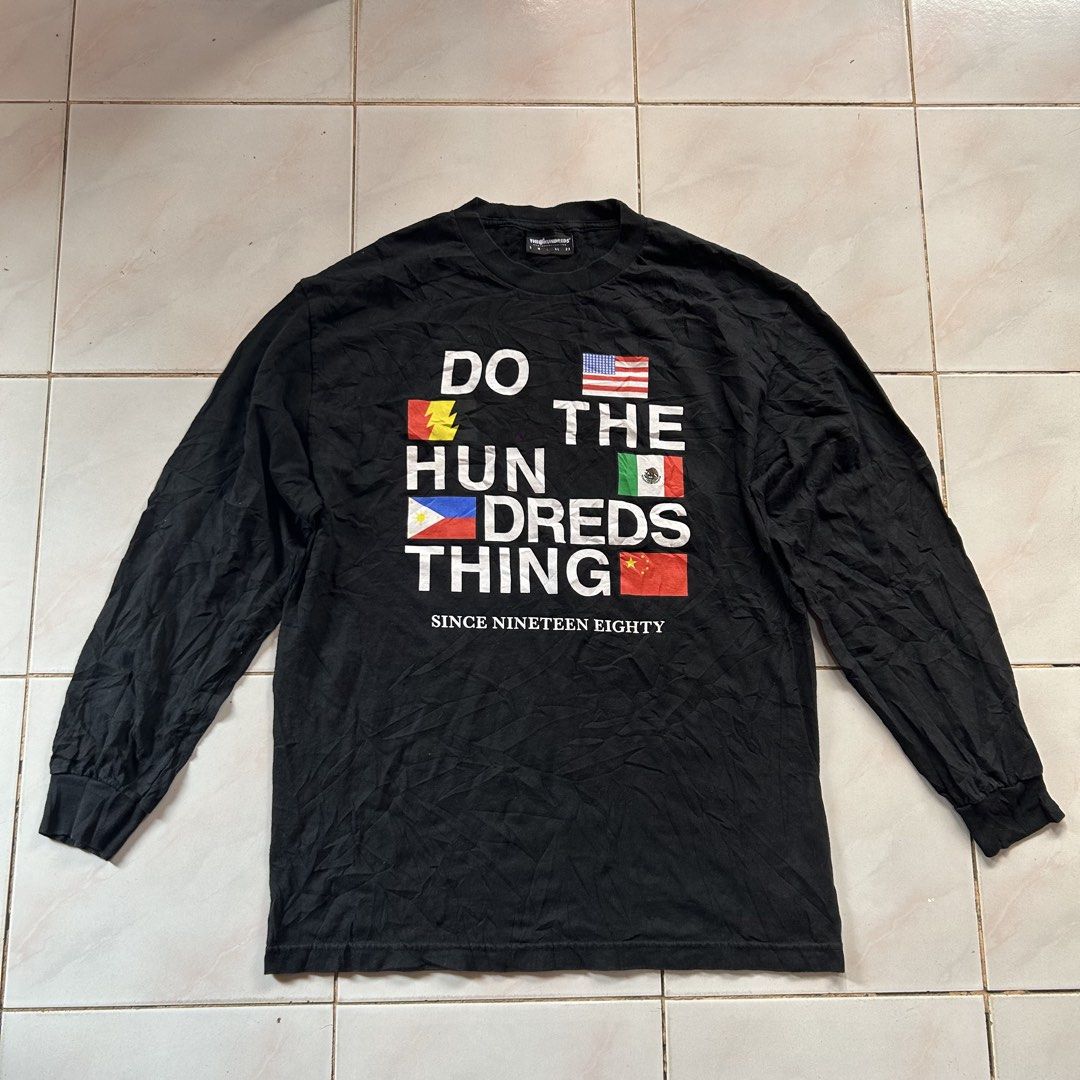 The Hundreds longsleeves 🔥 (Category: Tshirts & Polo Shirts ) located in Jinoba-an. Submitted by eegiboy (Listing ID 1467026579, Image 1). Description: - Brand: The Hundreds - Color: Black - Size: Large (L) - Style: Long sleeve crew neck shirt - Design: Chest graphic featuring 'DO THE HUNDREDS THING', international flags (USA, Mexico, Philippines, China), and 'SINCE NINETEEN EIGHTY' - Condition: Excellent, neatly stored - Shipping: Ships fast vi