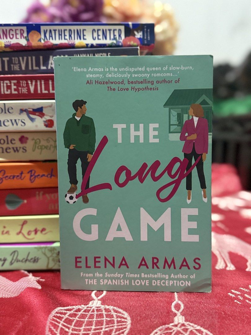The Long Game by Elena Armas (Category: Storybooks) located in Butuan. Submitted by shania439 (Listing ID 1466979125, Image 1). Description: - Title: The Long Game by Elena Armas (bestselling author of The Spanish Love Deception) - Genre: Slow-burn romance / Cute romcom with a soccer player cover - Format: Paperback - Condition: Clean spine and crisp edges, great for your bookshelf.