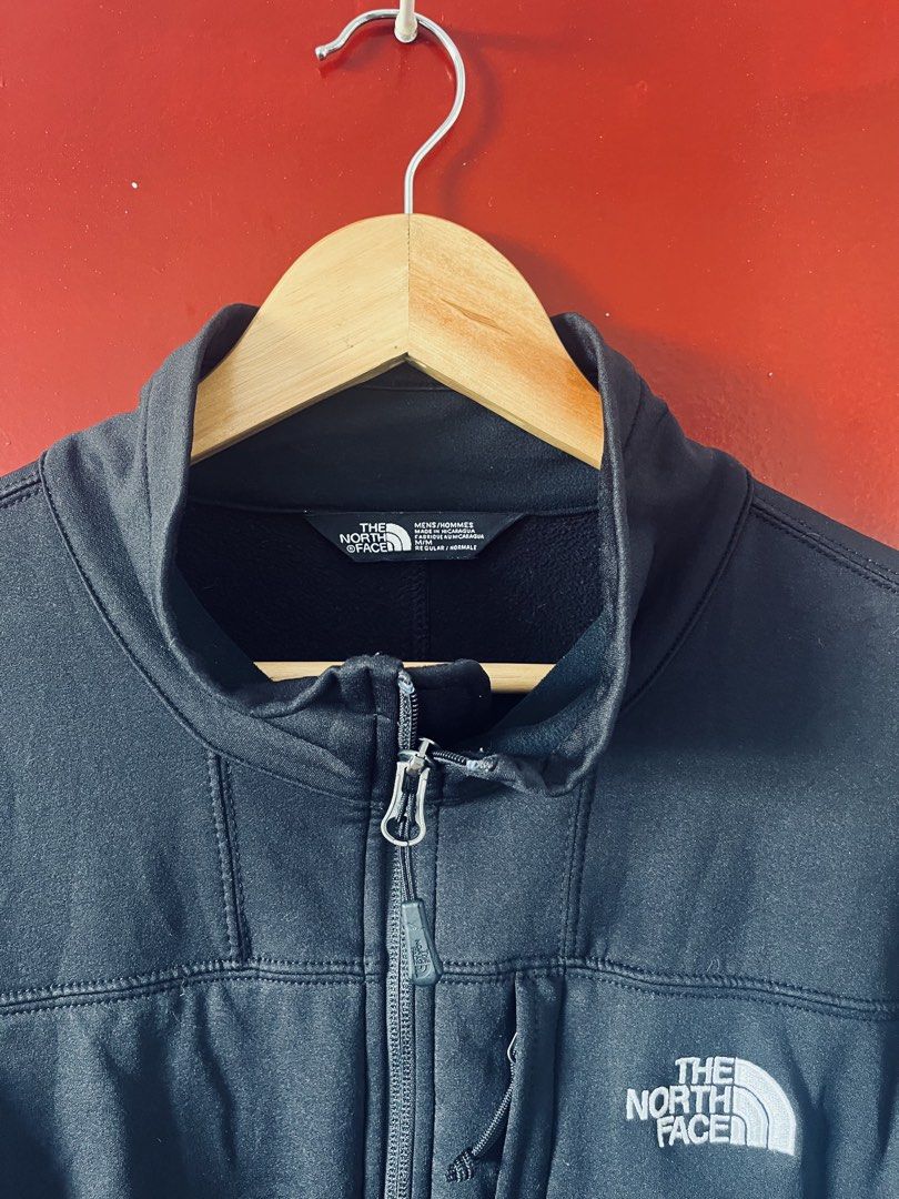 The North Face Men's Apex Bionic Softshell Jacket in black. (Category: Activewear) located in Quezon City. Submitted by wacpon_061972 (Listing ID 1446062143, Image 3). Description: This black The North Face softshell jacket features a zippered chest pocket and embroidered branding. (W-23/L-28).