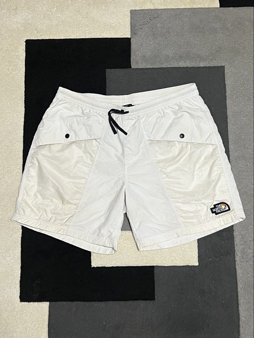 The North Face Pride Rainbow Logo Shorts White (Category: Shorts) located in Calasiao. Submitted by pb.supply_v2 (Listing ID 1467162422, Image 1). Description: - Authentic The North Face Pride collection white nylon shorts - Lightweight and breathable fabric for all-day comfort - Elastic waistband with adjustable black drawstring - Large front pockets with secure snap-button flaps - Convenient single zip pocket on the back right - Distinctive emb
