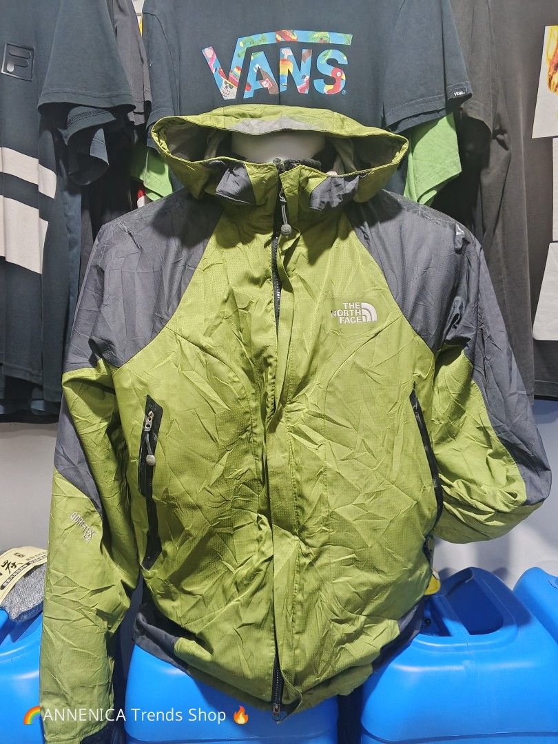 The North Face Summit Series GORE-TEX (Category: Coats, Jackets and Outerwear) located in Bulacan. Submitted by annenicathriftthriftlang (Listing ID 1466997407, Image 2). Description: The North Face Summit Series GORE-TEX XCR Jacket - Olive / Gray Men's Large / L 📏 Size: L on tag - Fits M-L ⚠️ ISSUES - PLEASE READ (Selling AS IS): - Seam tape peeling inside (common for vintage GORE-TEX) - Laminated patch cracked on sleeve - Small hole near front