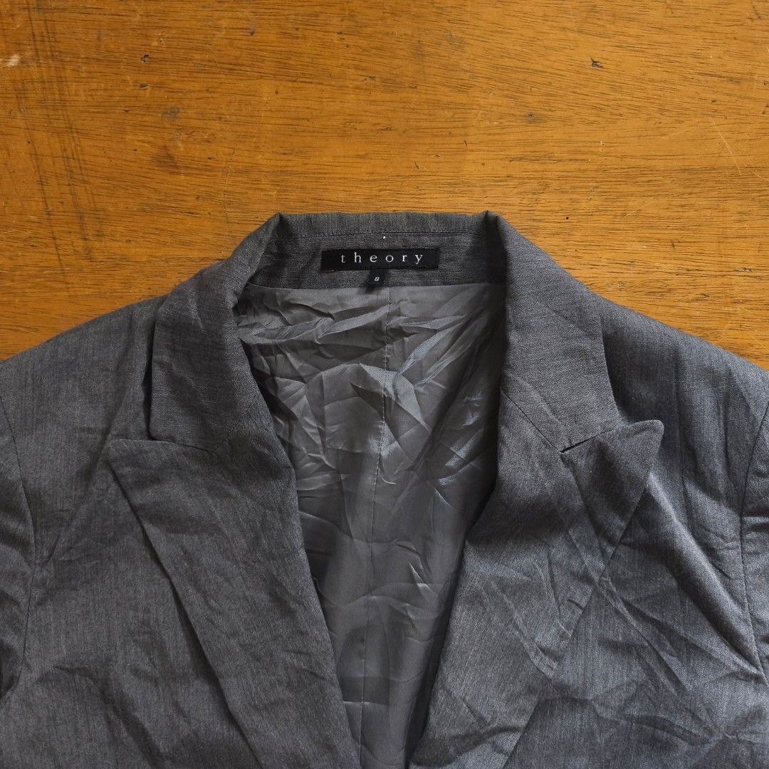 Theory Japan Blazer (Category: Luxury Apparel) located in Tayabas. Submitted by cat.b0i (Listing ID 1467088878, Image 2). Description: Size on tag: 8 Fitting: Men - M Women - M ‎Length: 24 ‎Width: bust 18.5, waist 16.5 ‎Shoulder: 15 ‎Arm Space: 8.5 ‎Sleeve Length: 24 ‎ ‎Color: Dark blue with oatmeal grey accents Color Rate: 9.2 ‎Material: 95% cotton, 4% Polyamide, 1% elastane properties: ‎Issues: needs wash ‎Condition: excellent.