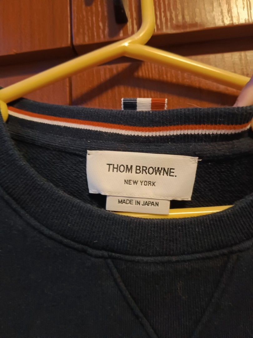 Thom Browne Navy Sweatshirt with White Stripes (Category: Luxury Apparel) located in Santiago. Submitted by jelkompany2023 (Listing ID 1427170155, Image 3). Description: small to medium. Excellent condition. Authenticity Guaranteed MADE IN JAPAN.