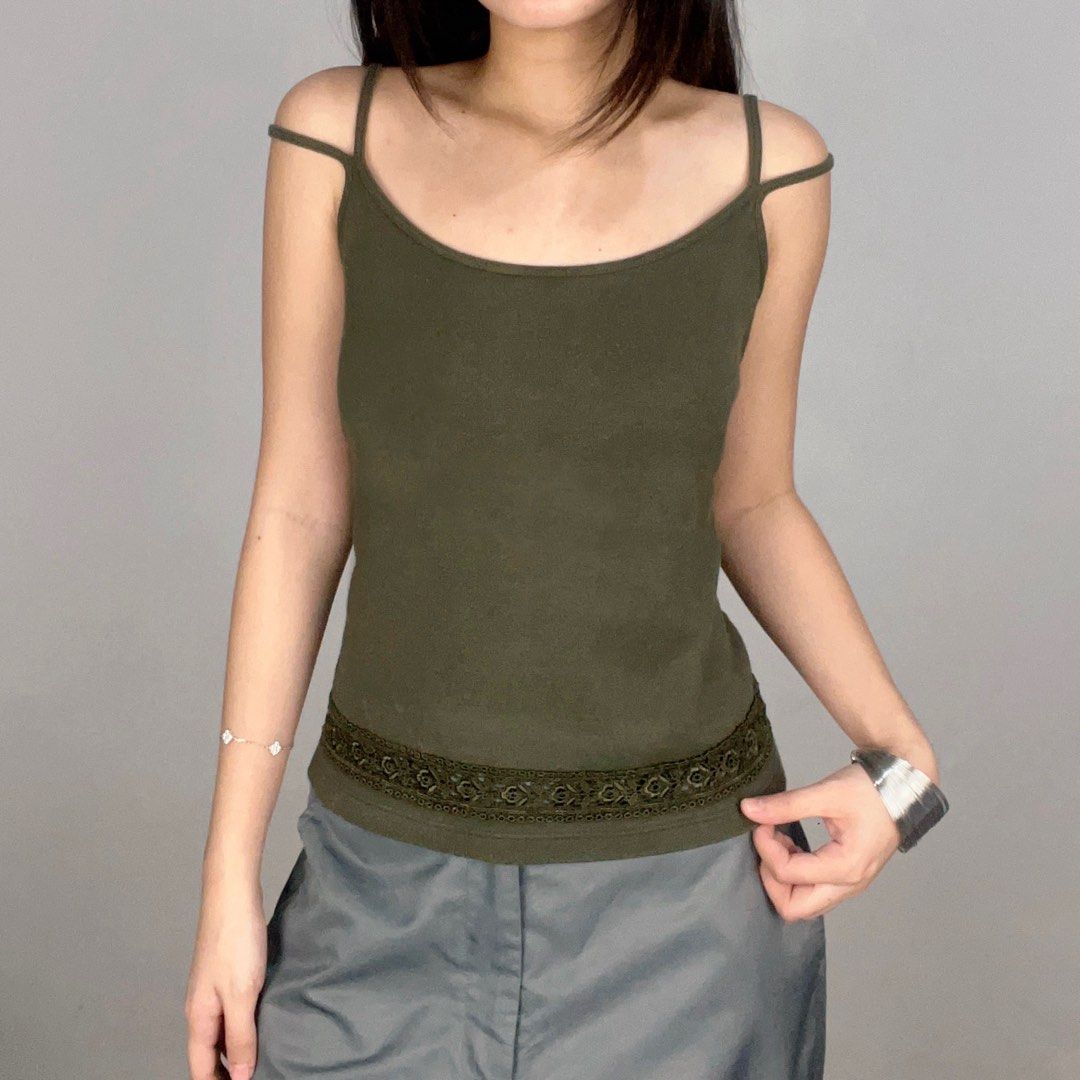 three gun double strap eyelet tank top (Category: Sleeveless) located in Manila. Submitted by pabili.ph (Listing ID 1467139028, Image 1). Description: medium to large L16", up to B36".