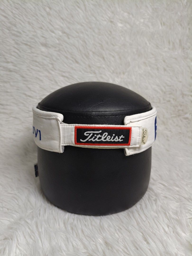Titleist FootJoy Golf Visor White Blue (Category: Golf) located in Imus. Submitted by grindhouse.thriftshop (Listing ID 1467060733, Image 3). Description: - Brand: Titleist & FootJoy - Color: White with gray under-brim - Design: Titleist embroidery on front, FJ logo on side - Closure: Adjustable strap with branded red & black patch - Condition: Excellent / Ready to use - Perfect for golf, tennis, and outdoor activities.