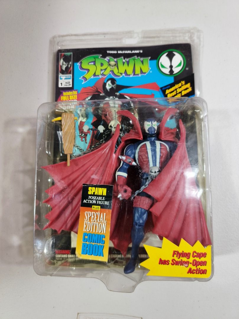Todd McFarlane's Spawn Action Figure Special Edition Comic Book (Category: Figurines & Statues) located in San Leonardo. Submitted by burgossanleonardo.12345 (Listing ID 1467102657, Image 2). Description: - Iconic Todd McFarlane Spawn action figure from Image Comics (Classic 90s collectible) - Fully poseable with a dynamic flying cape and fun swing-open action feature - Brand new in blister pack packaging - Includes a bonus full-size special edit
