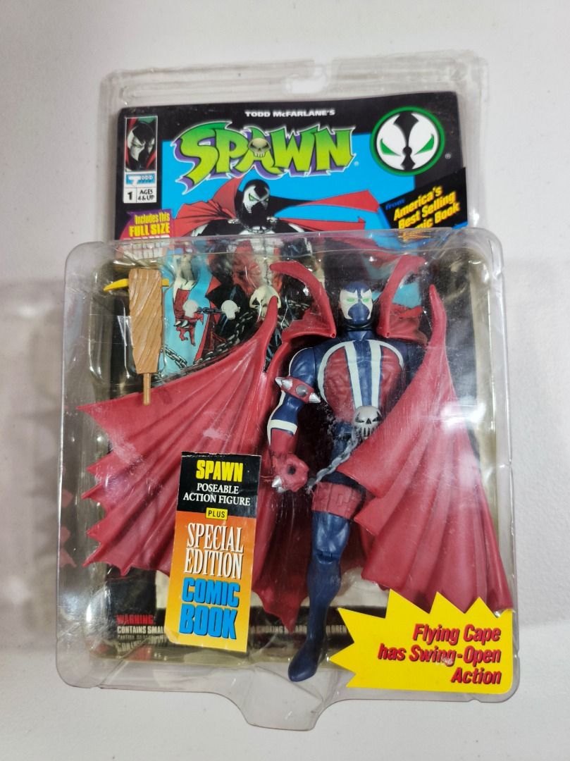 Todd McFarlane's Spawn Action Figure Special Edition Comic Book (Category: Figurines & Statues) located in San Leonardo. Submitted by burgossanleonardo.12345 (Listing ID 1467102657, Image 3). Description: - Iconic Todd McFarlane Spawn action figure from Image Comics (Classic 90s collectible) - Fully poseable with a dynamic flying cape and fun swing-open action feature - Brand new in blister pack packaging - Includes a bonus full-size special edit