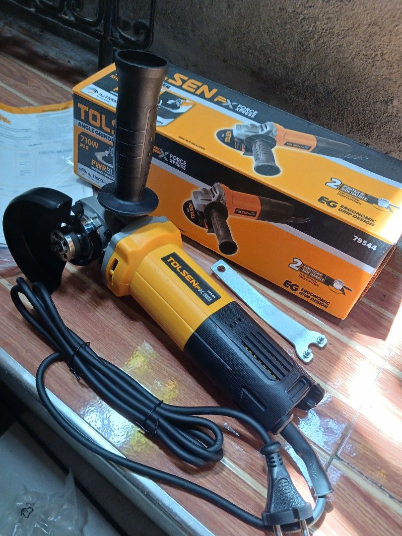 Tolsen FX Force Xpress Angle Grinder 79544 (Category: Construction Tools & Equipment) located in Cebu City. Submitted by joecristinesayson (Listing ID 1467048560, Image 1). Description: - Brand: Tolsen FX Force Xpress - Model: 79544 - Condition: Brand new, never used, complete in original box - Power: 710W - Speed: 11000 RPM - Spindle Thread: M10 - Color: Yellow and Black - Inclusions: Side handle and spanner wrench included.