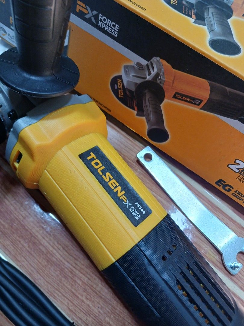 Tolsen FX Force Xpress Angle Grinder 79544 (Category: Construction Tools & Equipment) located in Cebu City. Submitted by joecristinesayson (Listing ID 1467048560, Image 2). Description: - Brand: Tolsen FX Force Xpress - Model: 79544 - Condition: Brand new, never used, complete in original box - Power: 710W - Speed: 11000 RPM - Spindle Thread: M10 - Color: Yellow and Black - Inclusions: Side handle and spanner wrench included.