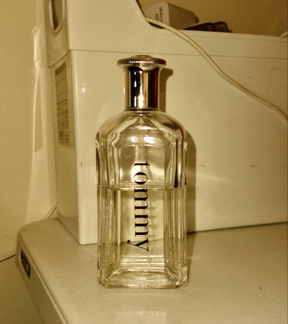 Tommy by Tommy Hilfiger Men's Perfume (Category: Fragrance & Deodorants) located in Manila. Submitted by jayzee1101 (Listing ID 1466991489, Image 1). Description: Pre-owned Brand: Tommy Hilfiger Fragrance Name: Tommy Type: Eau de Toilette Formulation: Spray Condition: Pre-owned, partially used. No box. Condition Details: This item is used and does not come with the original box. The bottle is approximately 65% full. Please carefully review all ph