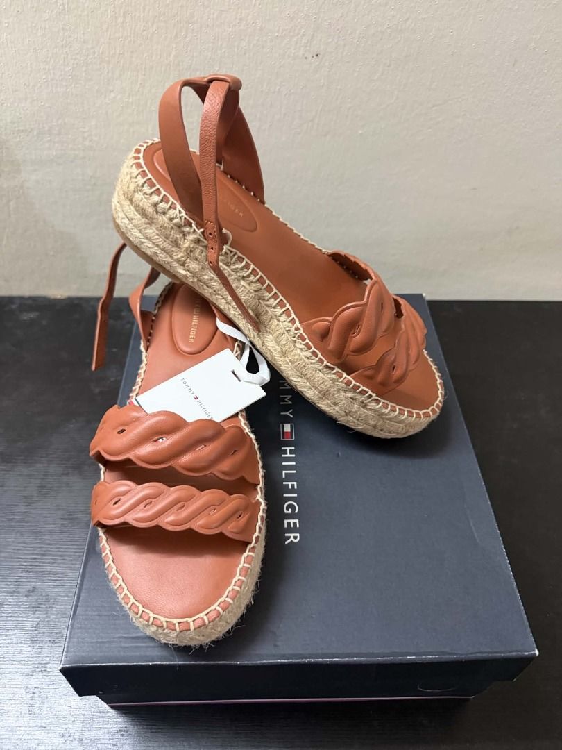 Tommy Hilfiger Brown Sandals (Category: Sandals) located in Minglanilla. Submitted by dthreestore (Listing ID 1466985745, Image 1). Description: Brand new Tommy Hilfiger brown espadrille sandals with box and tag. Stylish braided straps and comfortable wedge heel. ▪︎Php 1,400 ▪︎Brand New Authentic ▪︎Can ship nationwide ▪︎Follow us on Facebook: D3 Store ▪︎Mode of Payment: Cash/Gcash 🚚 Maxim / J&T (Shipping fee will be shouldered by the buyer) 📍Me