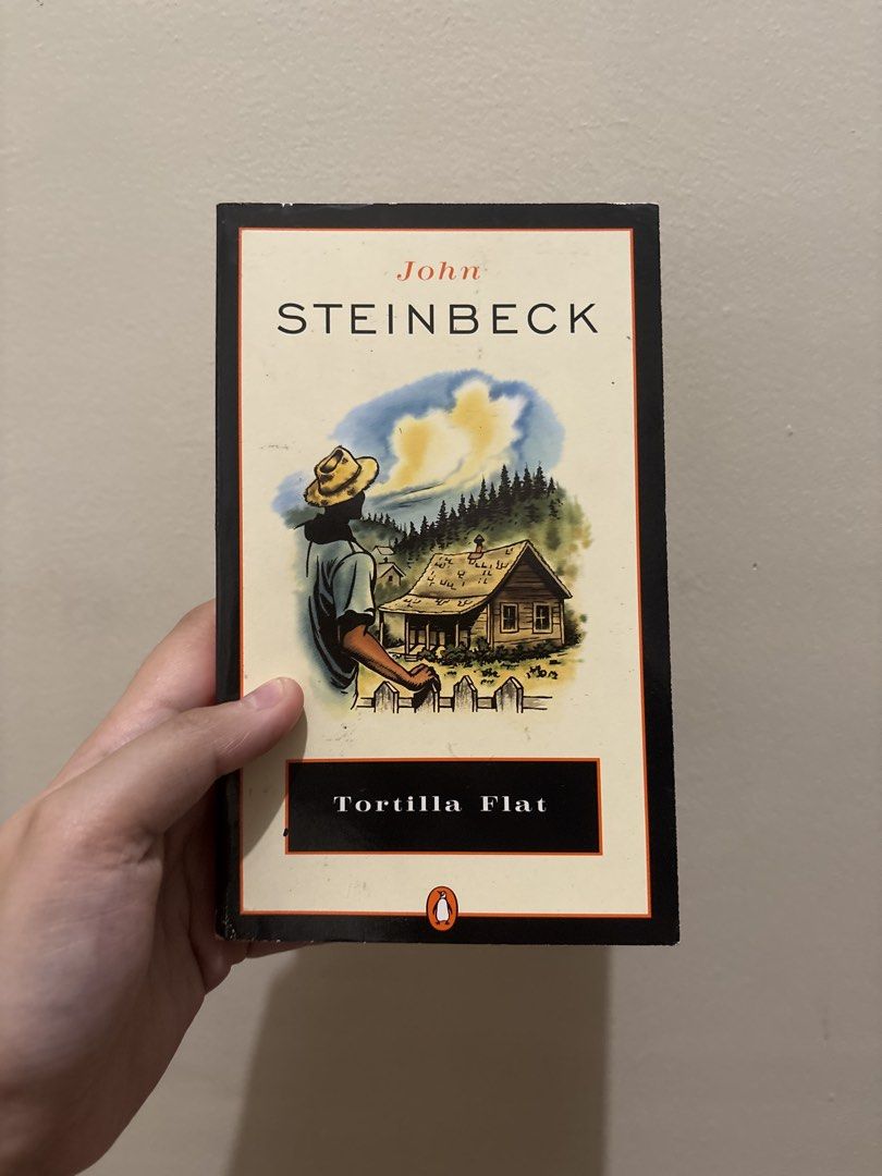 Tortilla Flat by John Steinbeck Penguin Paperback (Category: Storybooks) located in Quezon City. Submitted by spongkiiii (Listing ID 1466983166, Image 1). Description: - Title: Tortilla Flat by John Steinbeck - Edition: Penguin paperback with classic orange spine - Condition: Binding is fully intact; pages have slight tanning; no writings or highlights -original copy, not a reprint.