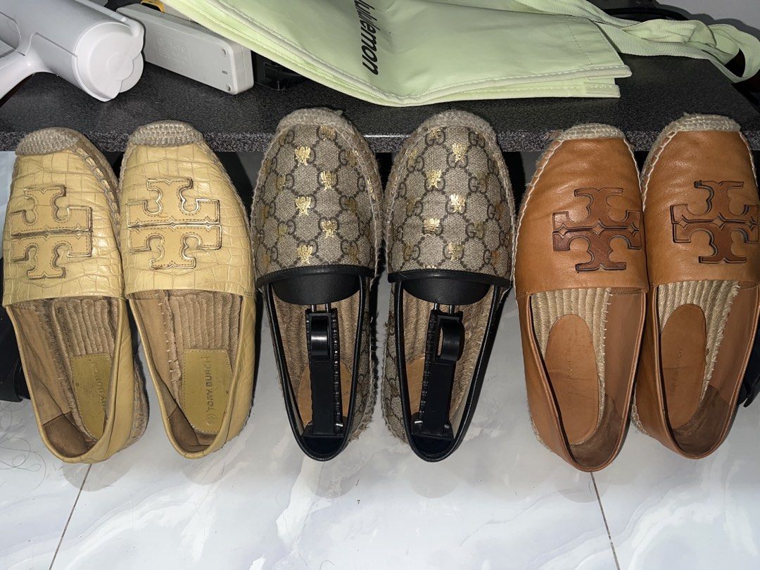 Tory Burch and Gucci Espadrilles Collection (Category: Sneakers & Footwear) located in Marikina City. Submitted by ash_2 (Listing ID 1467026240, Image 1). Description: Espadrilles cream croc-embossed Tory Burch flats, GG Supreme bee motif Gucci slip-ons, and tan leather Tory Burch loafers. Jute rope soles with rubber outsoles. Great rotation for warm weather outfits. Various designer styles in classic neutral tones..