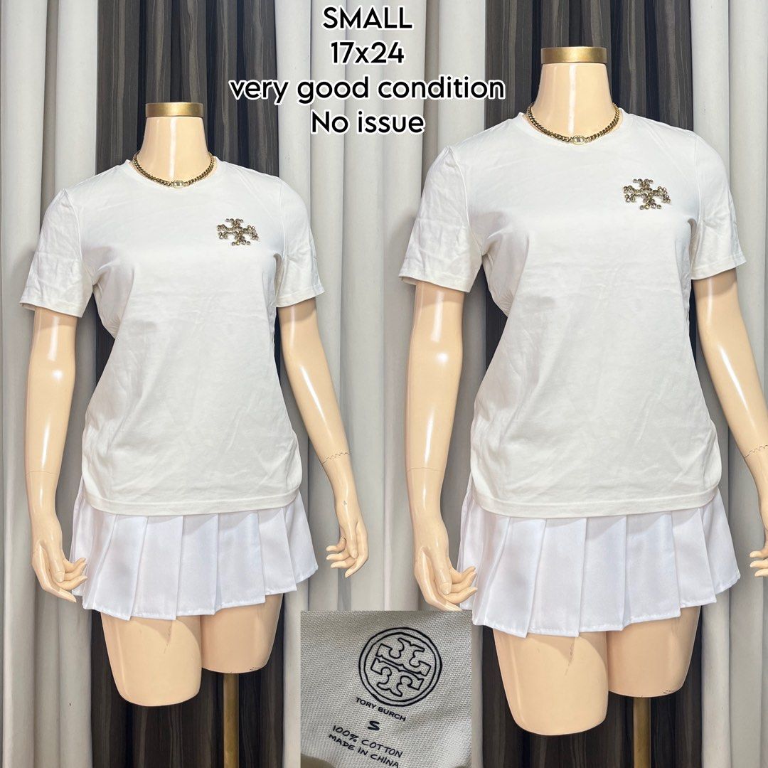 Tory Burch Crystal Logo T-Shirt Size Small (Category: Shirts) located in Naga. Submitted by rmapprl (Listing ID 1467093890, Image 1). Description: - Brand: Tory Burch - Material: 100% Cotton (Made in China) - Size: Small - Measurements: 17 inches across (pit-to-pit) x 24 inches down (length) - Design: Short sleeves, crew neckline, rhinestone embellished logo on left chest - Condition: Very clean, no damage or flaws.
