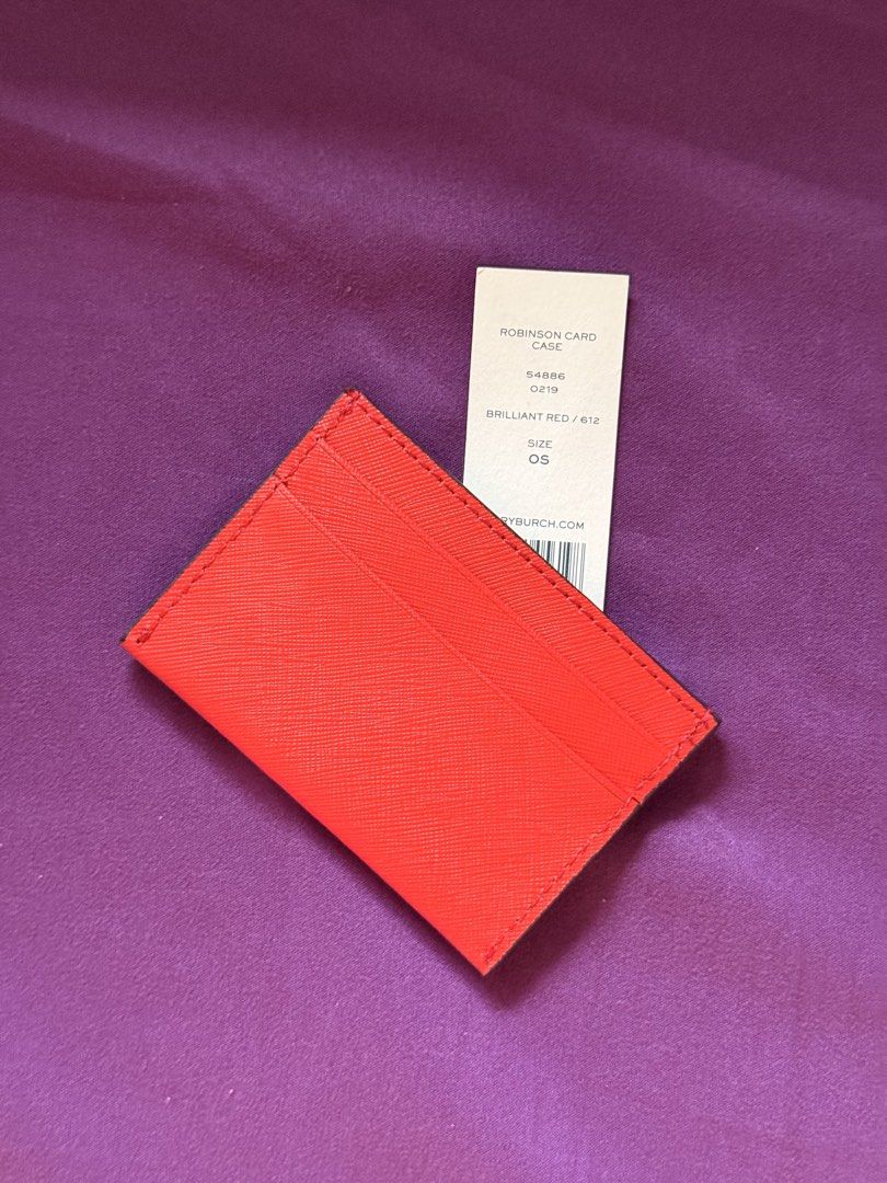Tory Burch Robinson Card Case Brilliant Red (Category: Wallets & Card holders) located in Mandaluyong City. Submitted by thesellingcat (Listing ID 1467014475, Image 3). Description: - Brand: Tory Burch - Style: Robinson Card Case (Style: 54886, Color: 612) - Condition: Brand new with tags (BNWT), never used - Material: Durable Saffiano leather in brilliant red - Hardware: Gold-tone with signature TB logo medallion - Compartments: Multiple card sl