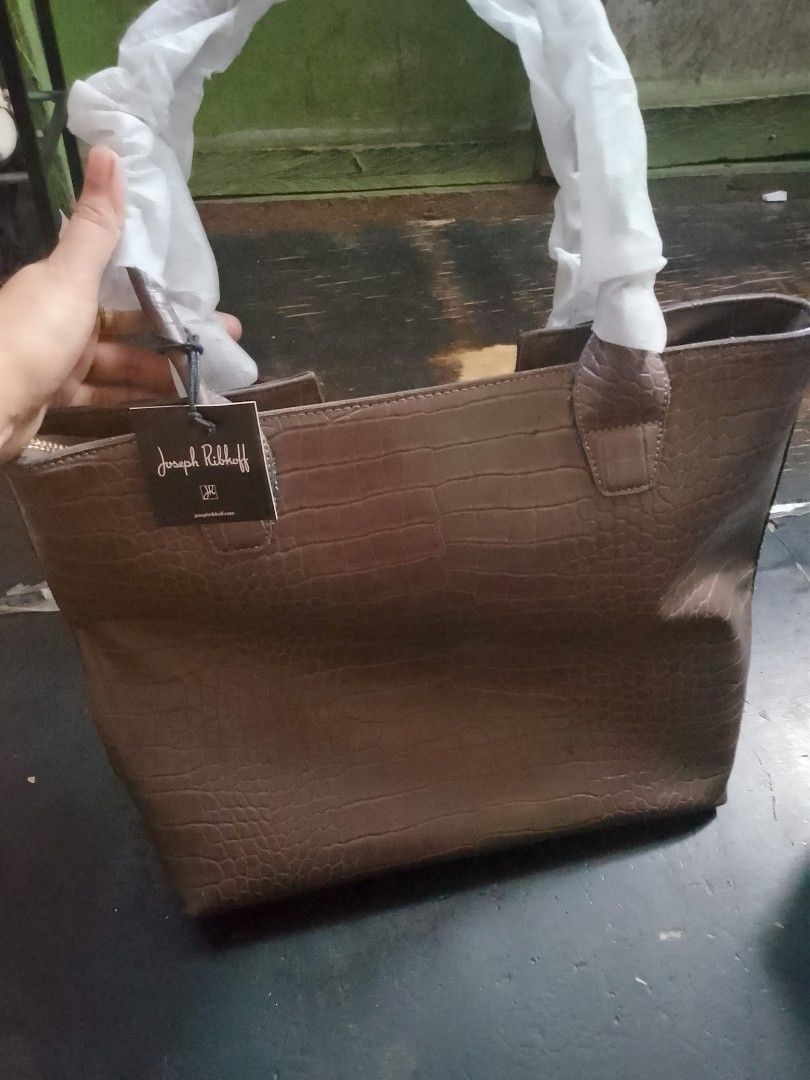 Tote bag Joseph ribbkoff (Category: Luxury Bags & Wallets) located in Manila. Submitted by livedeer.b106a0 (Listing ID 1467067352, Image 1). Description: Selling my authentic Joseph Ribkoff designer bag. • Brand: Joseph Ribkoff (Premium Canadian Designer Brand) • Condition: Pre-loved, in good condition. • Inclusions: Bag only with dust bag/strap). • Reason for Selling (RFS): Decluttering/Hindi nagagamit.