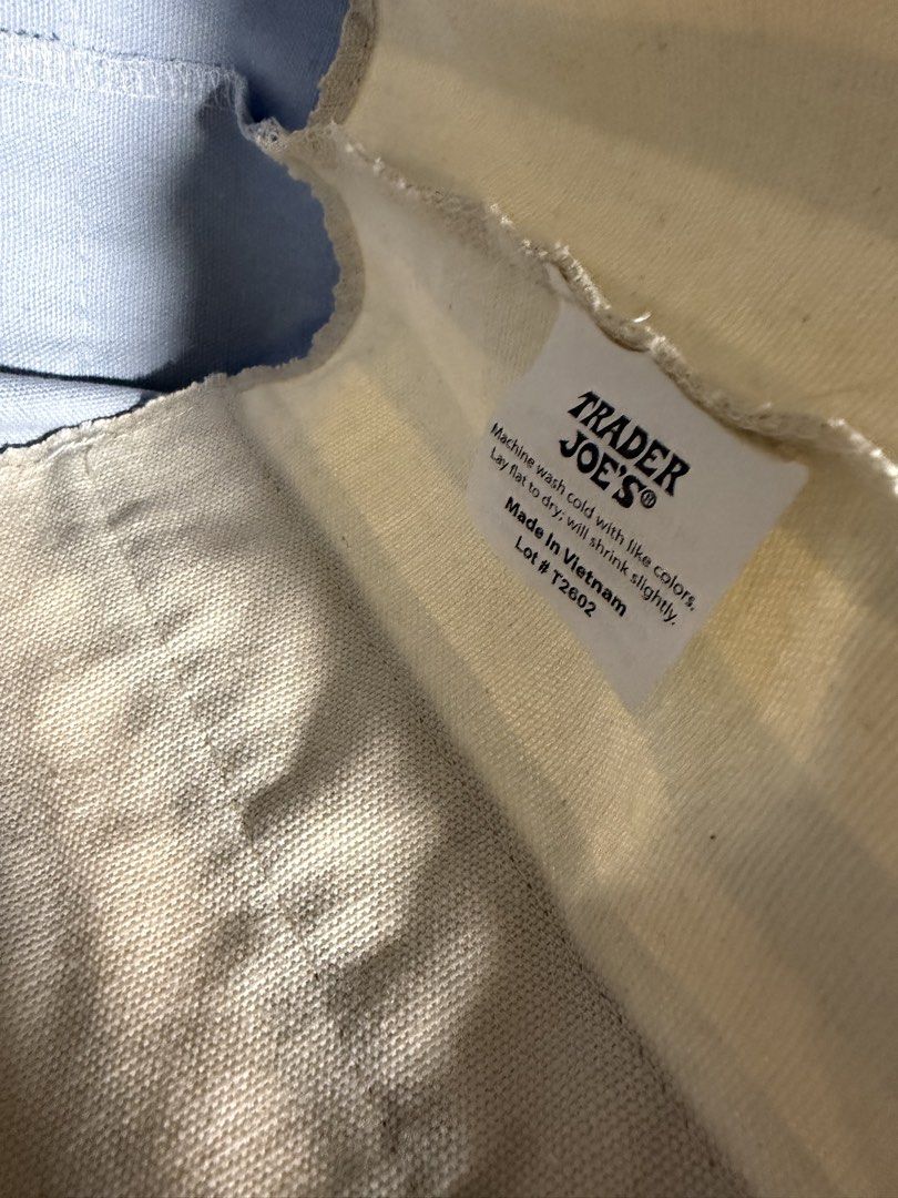 Trader Joe's Striped Mini Canvas Tote Bag (Category: Tote Bags) located in Davao. Submitted by billytings (Listing ID 1467045682, Image 3). Description: Brand: Trader Joe's Color: Blue USED ONCE; GIFTED AS PASALUBONG FROM 🇺🇸‼️ Disclaimer: minimal stains; can be washed (refer to the 5th and 6th picture)✨ Refer to the Trader Joe's website for further details on the bag .