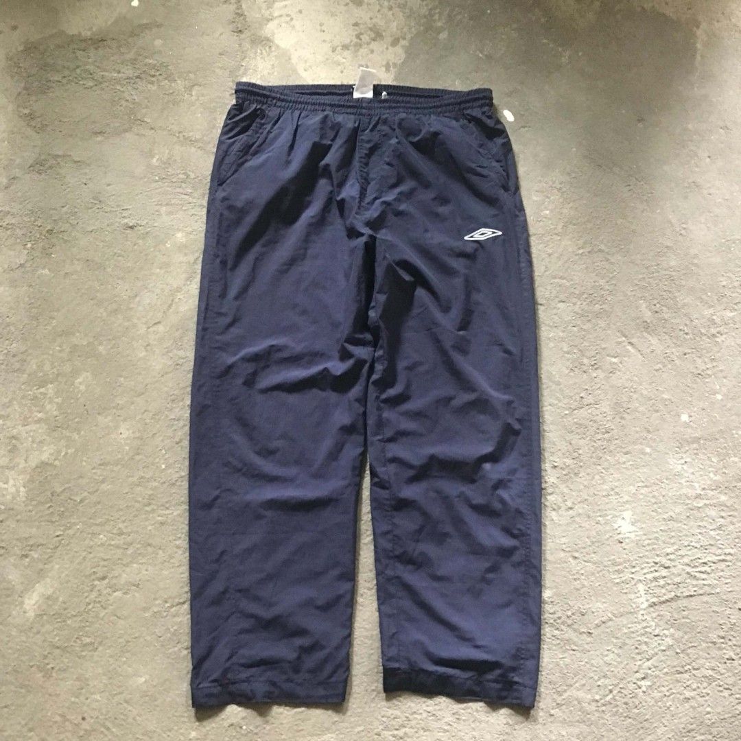 Umbro track pants (Category: Joggers) located in Cavite. Submitted by totchimpanzee (Listing ID 1467080309, Image 1). Description: 370 shipped W: 28-35 inches stretched L: 39.5 Leg opening: 8.5 📍Indang, Cavite Ship via J&T, payment first Gcash payment.