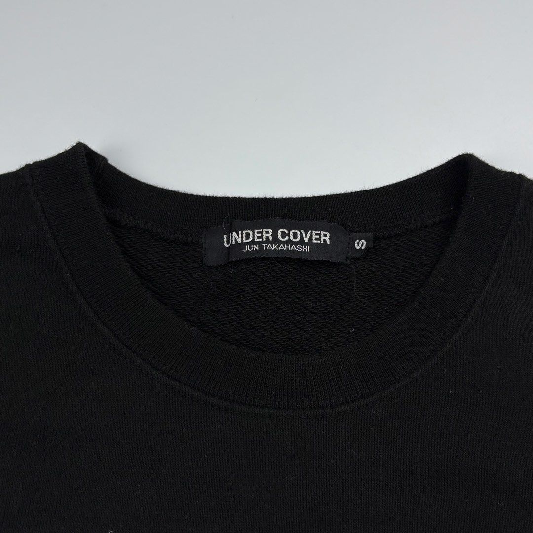 Undercover - Jun Takahashi - Logo Sweater (Category: Luxury Apparel) located in Bacolod City. Submitted by cast.archives (Listing ID 1467111725, Image 2). Description: Undercover - Jun Takahashi - Logo Sweater Size: Small fits Medium Condition: Good Flaw: Dirt sa print.
