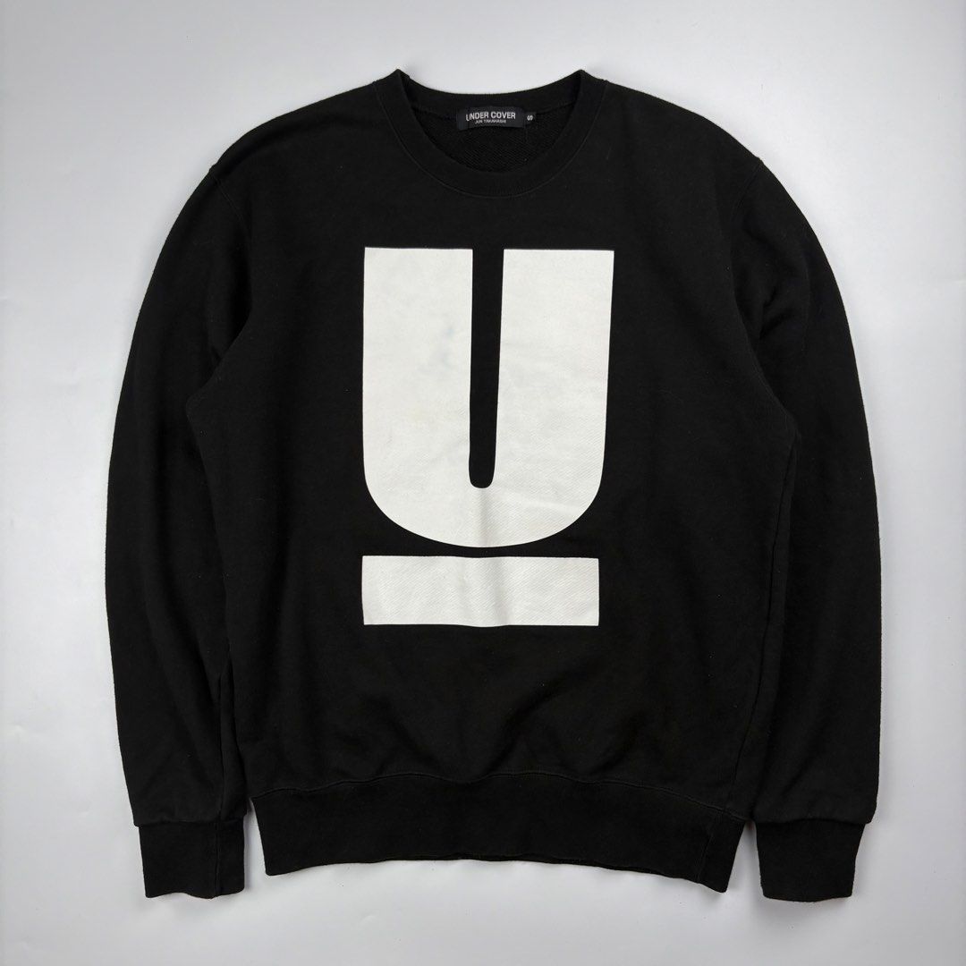 Undercover - Jun Takahashi - Logo Sweater (Category: Luxury Apparel) located in Bacolod City. Submitted by cast.archives (Listing ID 1467111725, Image 1). Description: Undercover - Jun Takahashi - Logo Sweater Size: Small fits Medium Condition: Good Flaw: Dirt sa print.