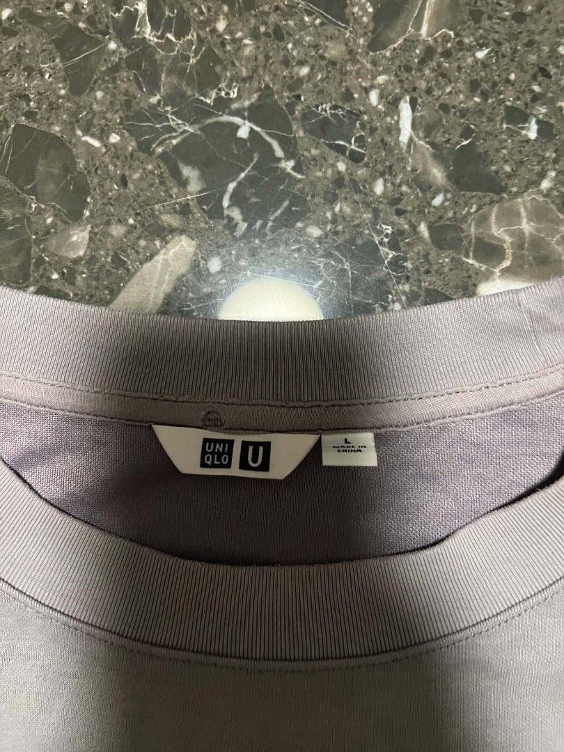 UNIQLO AIRSIM (Category: Shirts) located in San Fernando. Submitted by _jaximus (Listing ID 1467139435, Image 2). Description: - Brand/Model: Uniqlo U Crew Neck T-Shirt - Color: Lilac Purple - Size: Large (Made in China) - Fit & Fabric: Relaxed fit, premium heavyweight fabric - Condition: Clean, no stains, no holes - Style: Versatile everyday casual staple.