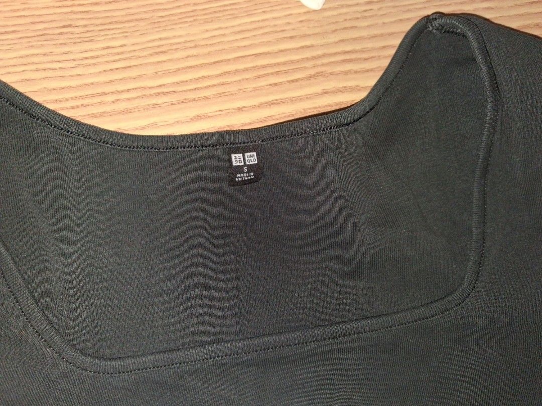 Uniqlo Black Square Neck Crop Top (Category: Sleeveless) located in Manila. Submitted by kxkcx (Listing ID 1467027649, Image 2). Description: - Color: Black - Style: Cropped tee with square neckline and short sleeves - Material: Ribbed cotton - Size: Small (Made in Vietnam) - Condition: Clean, from a smoke-free home - Perfect for pairing with high-waisted jeans or skirts.