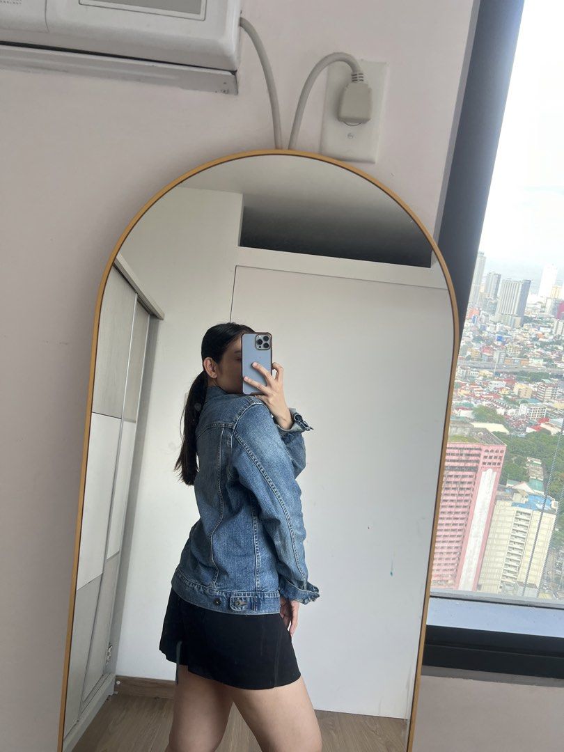 Uniqlo Blue Denim Jacket Size M (Category: Coats, Jackets and Outerwear) located in Makati City. Submitted by warm.abc123 (Listing ID 1466978522, Image 3). Description: - Brand: Uniqlo - Size: Medium - Color: Classic blue denim wash - Design: Button-up front, collar, and chest flap pockets - Details: Long sleeves with button cuffs - Origin: Made in China - Condition: Great wardrobe staple, perfect for layering.