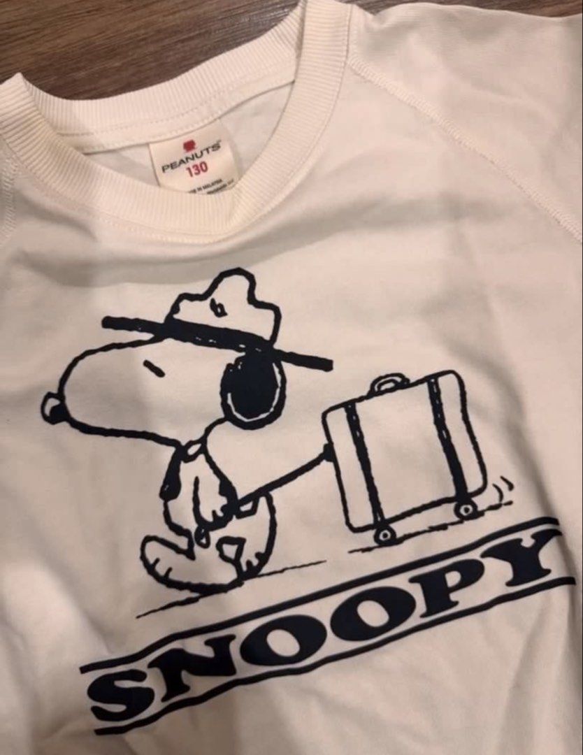 UNIQLO Cute White Snoopy Top (Category: Blouses) located in Manila. Submitted by new.milla (Listing ID 1467029444, Image 2). Description: used twice; makeup marks on the neckline but can be removed!.