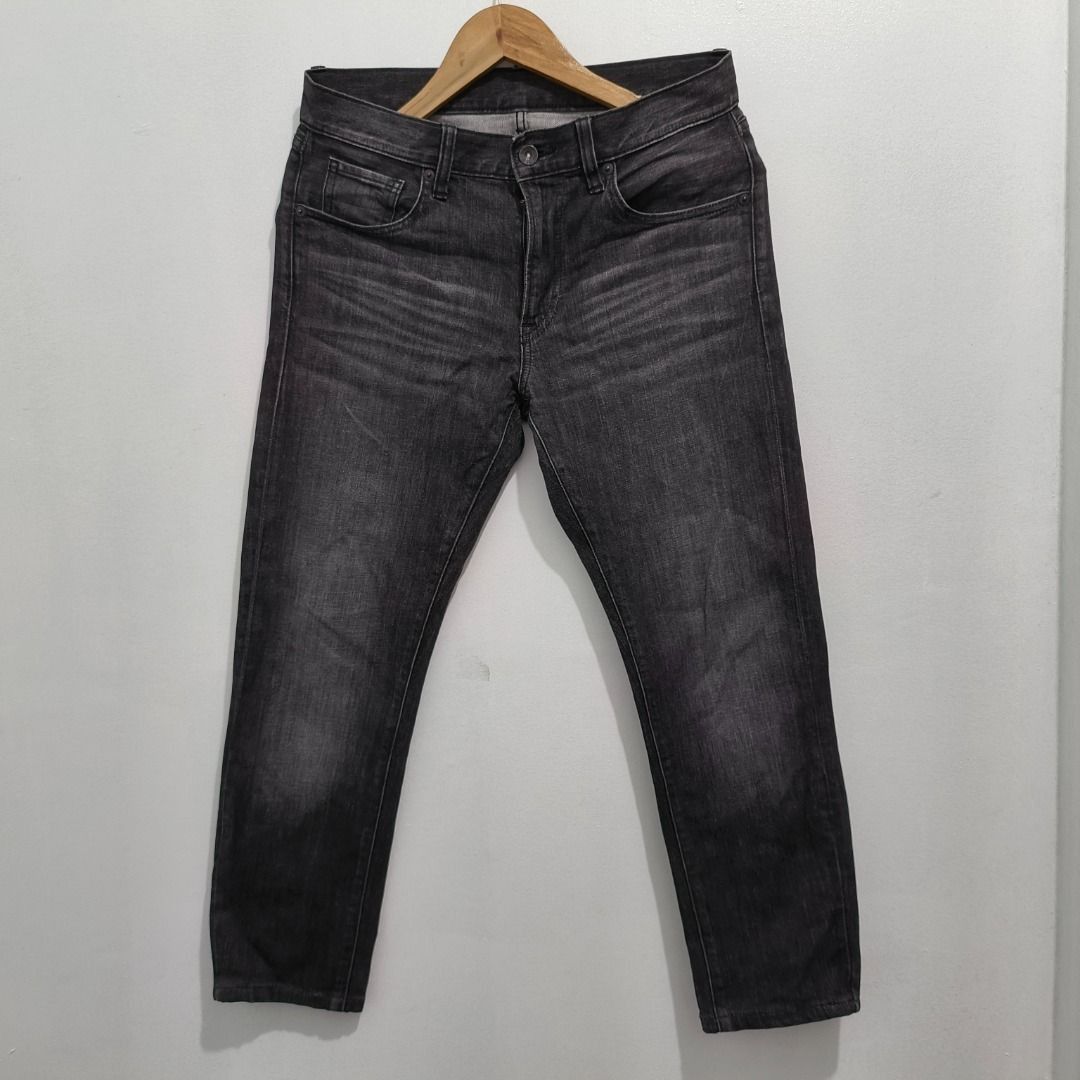 PREOWNED Uniqlo Grey Jeans Size 30 (Category: Jeans) located in Manila. Submitted by blackhaven98 (Listing ID 1467057925, Image 1). Description: - Brand: Uniqlo - Color: Grey with faded wash effect at thighs and pockets - Size: Waist 30 (76cm) - Material: 99% cotton, 1% spandex for comfortable stretch - Rise: Mid rise - Closure: Zip fly with button closure - Details: Classic five-pocket design, standard belt loops, and clean interior tags - Origi