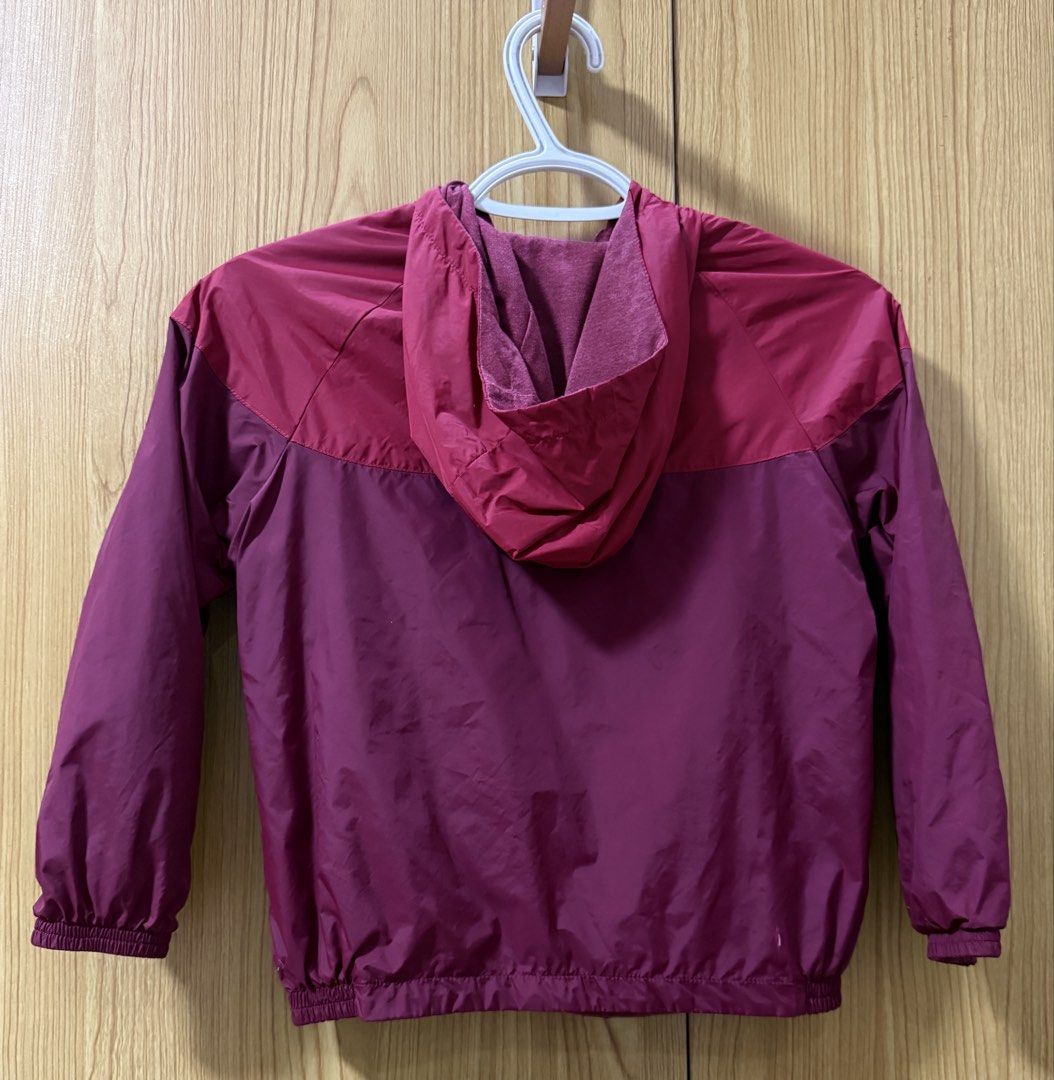 UNIQLO Kids Reversible Jacket (Category: Babies & Kids Fashion) located in Quezon City. Submitted by cleaningmomma (Listing ID 1467071002, Image 2). Description: - Style: Maroon and red two-tone colorblock hooded windbreaker -Size - 120 - Closure: Full zip front - Fit & Features: Elastic cuffs and hem to lock in warmth and keep the wind out -Reversible - Measurements: Chest 18 inches across, Length 18.5 inches down - Condition/Use: Great layering
