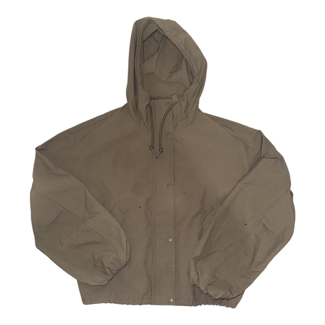 Uniqlo Parka in Beige (Category: Coats, Jackets and Outerwear) located in Santa Rosa. Submitted by elo.declutters (Listing ID 1467155617, Image 1). Description: This parka goes to my favorite tier. Selling it low because it was damaged in the laundromat. RFS: Ink stains all over the jacket Condition: 7/10 (Fair).