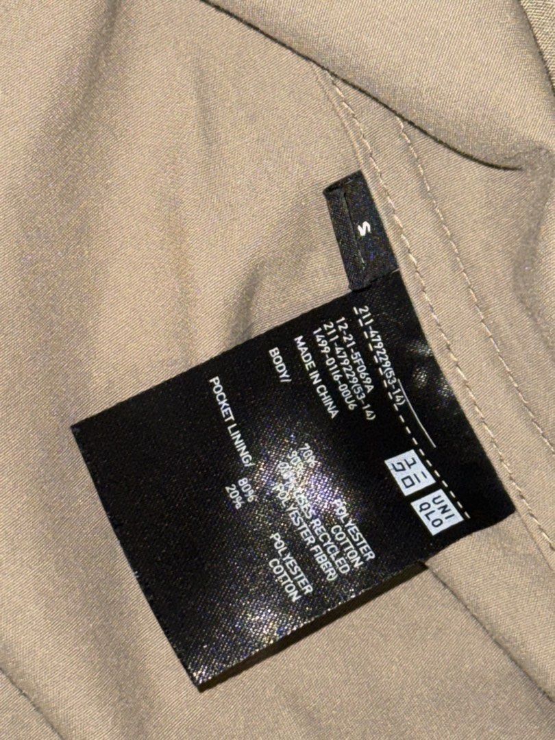 Uniqlo Parka in Beige (Category: Coats, Jackets and Outerwear) located in Santa Rosa. Submitted by elo.declutters (Listing ID 1467155617, Image 3). Description: This parka goes to my favorite tier. Selling it low because it was damaged in the laundromat. RFS: Ink stains all over the jacket Condition: 7/10 (Fair).
