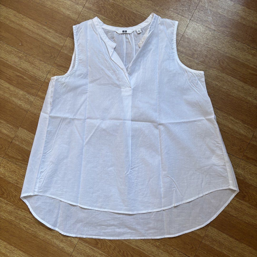 Uniqlo White Sleeveless Linen Top (Category: Sleeveless) located in Caloocan City. Submitted by prelovedby.ericka (Listing ID 1467052584, Image 1). Description: .