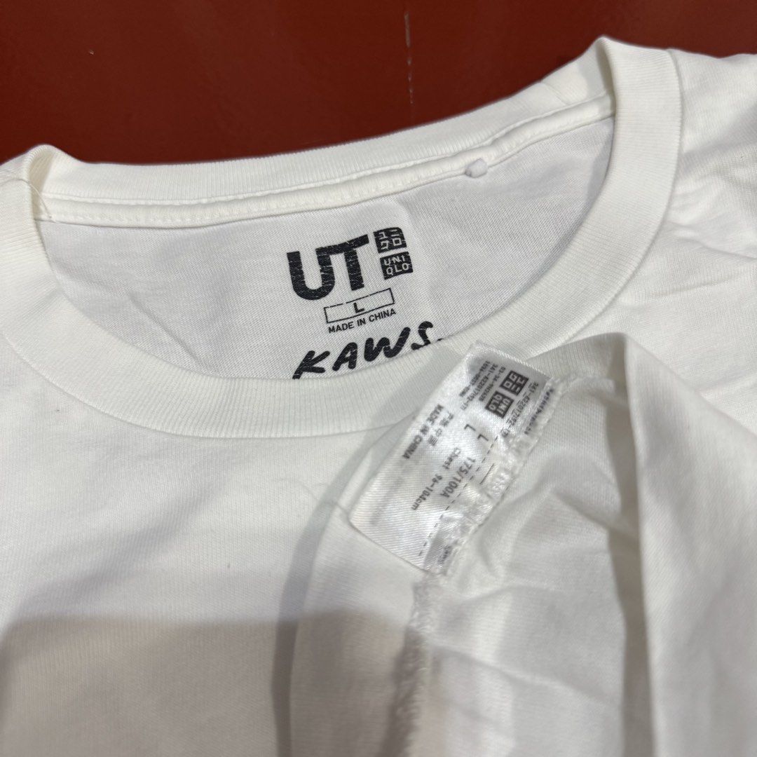 UNIQLO X KAWS (Category: Formal Shirts) located in Pasig City. Submitted by buzzthrifty (Listing ID 1467001601, Image 3). Description: SIZE M-L 20x26 EXCELLENT CONDITION WASH KONTI.