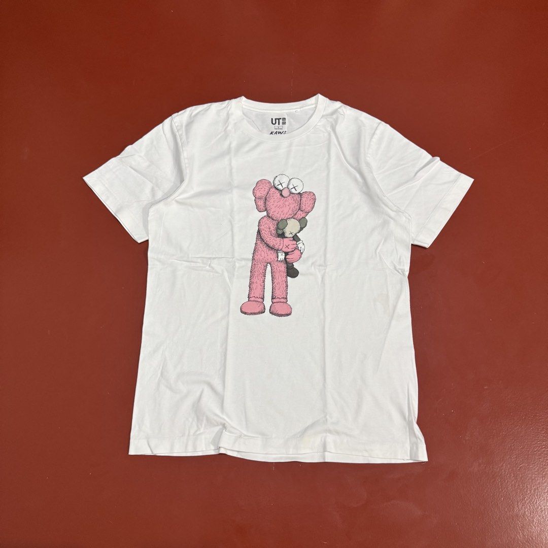UNIQLO X KAWS (Category: Formal Shirts) located in Pasig City. Submitted by buzzthrifty (Listing ID 1467001601, Image 1). Description: SIZE M-L 20x26 EXCELLENT CONDITION WASH KONTI.