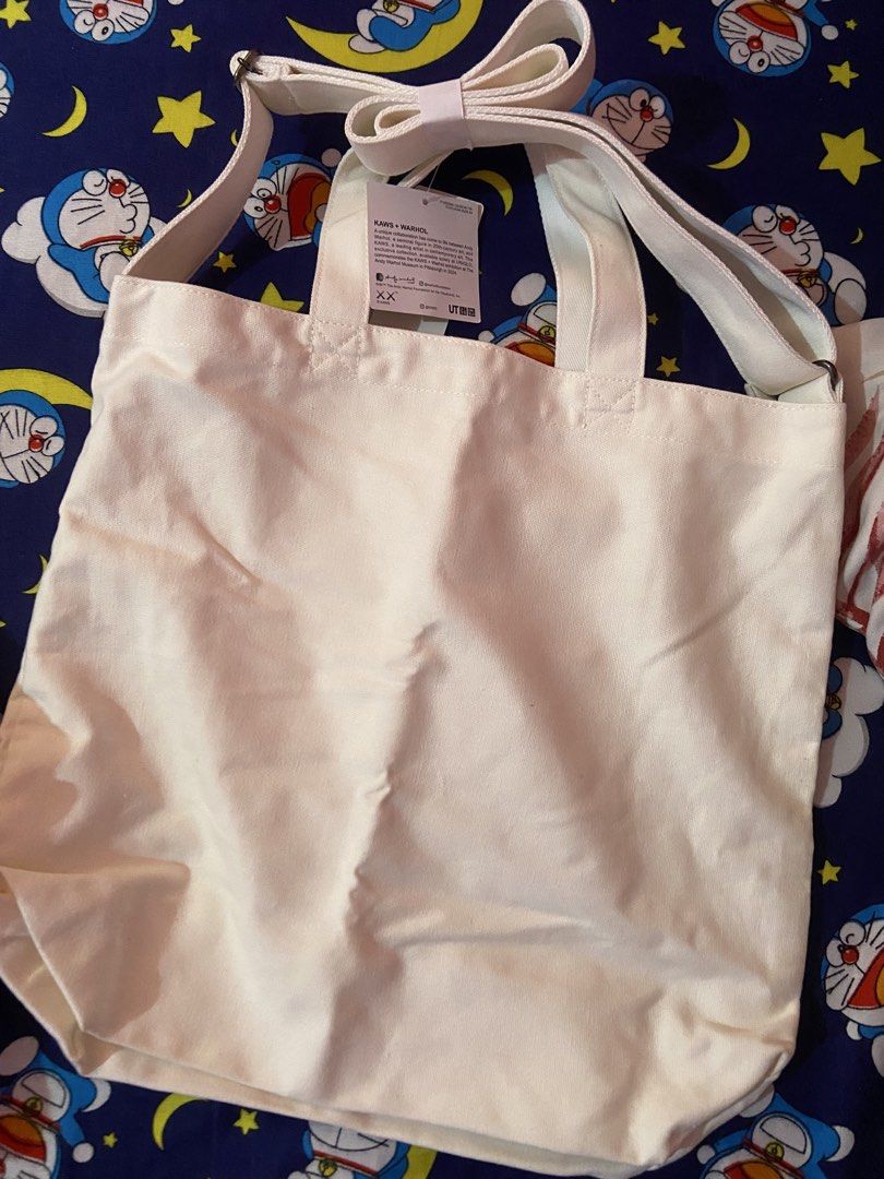Uniqlo x Kaws+Warhol (Category: Tote Bags) located in Bulacan. Submitted by itsmebrig (Listing ID 1467052492, Image 3). Description: Brand new nag never been used. DM!! .