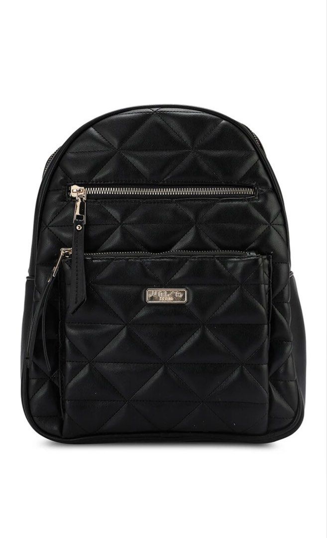 Unisa Black Quilted Backpack (Category: Backpacks) located in Mandaluyong City. Submitted by katsandkisses (Listing ID 1467148262, Image 1). Description: - Brand: Unisa - Color: Classic Black - Material: Clean, durable faux leather - Design: Elegant quilted diamond pattern with gold metal logo plaque - Compartments: Secure top zip closure and convenient front zip pocket - Straps: Comfortable, adjustable shoulder straps - Extra: Protective metal f