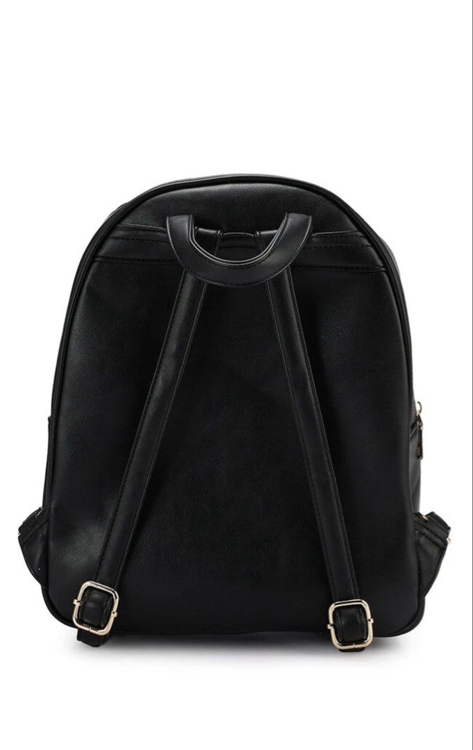 Unisa Black Quilted Backpack (Category: Backpacks) located in Mandaluyong City. Submitted by katsandkisses (Listing ID 1467148262, Image 2). Description: - Brand: Unisa - Color: Classic Black - Material: Clean, durable faux leather - Design: Elegant quilted diamond pattern with gold metal logo plaque - Compartments: Secure top zip closure and convenient front zip pocket - Straps: Comfortable, adjustable shoulder straps - Extra: Protective metal f
