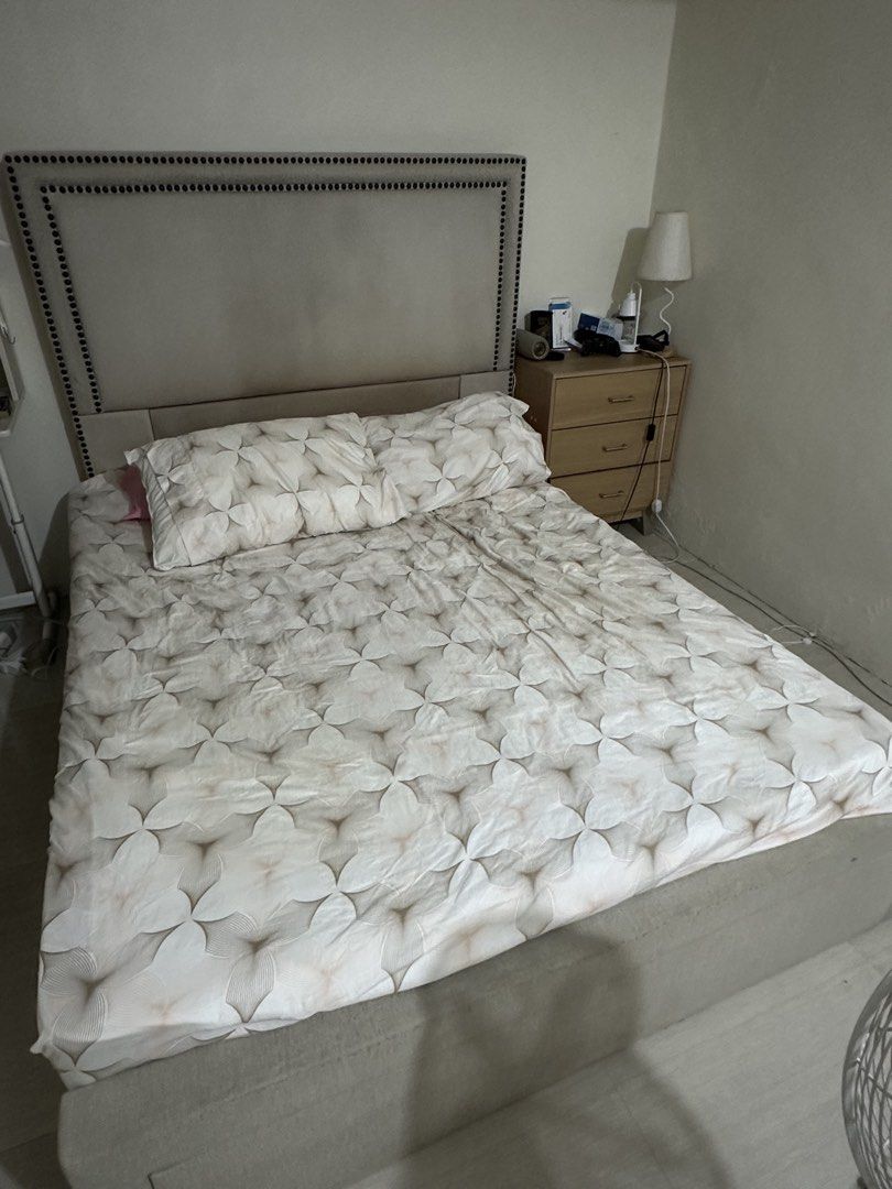 Queen size Bed beige (Category: Bed Frames & Mattresses) located in Muntinlupa City. Submitted by fa.jha (Listing ID 1467148180, Image 1). Description: - Tufted fabric headboard with elegant dark nailhead trim - Neutral beige upholstery that matches any room decor -needs deep cleaning or upholstery again -Some fix on the bottom support of the bed -Matress not included - RUSH SALE / PM for inquiries! .