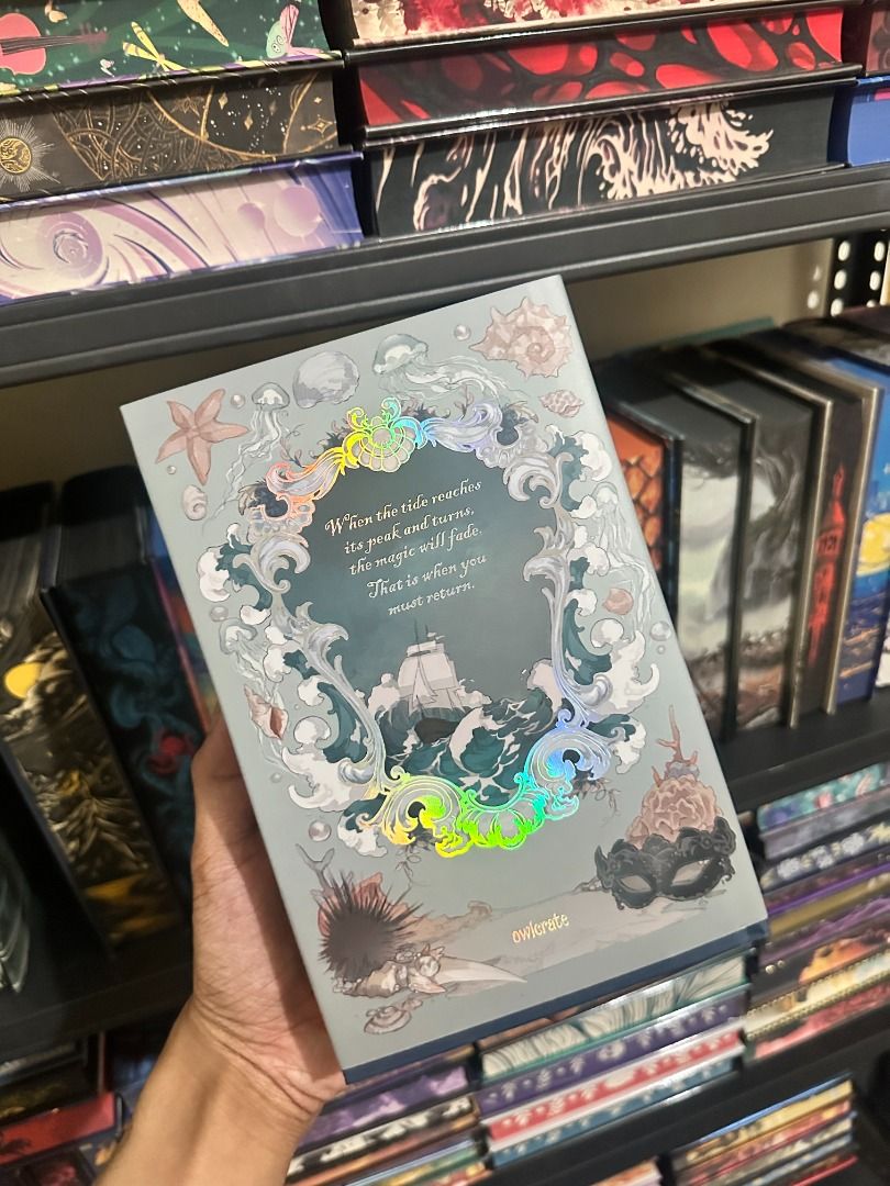 Upon A Starlit Tide Owlcrate Edition (Category: Storybooks) located in Pasay City. Submitted by library_hecate (Listing ID 1467028782, Image 3). Description: - Special edition book from Owlcrate - Grey hard slipcase with metallic foil artwork (ship, sea creatures, and quotes) - Sprayed page edges with shell pattern, compass design, and 'BE BRAVE' / 'BE FREE' phrases - Condition: Clean edges, no marks, like new.