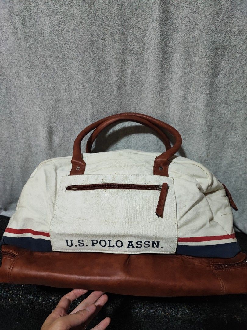 U.S. Polo Assn. Canvas Duffel Bag (Category: Sling Bags) located in Baguio. Submitted by jayrgijc52758 (Listing ID 1466979924, Image 2). Description: US Polo Assn traveling bag Has base compartment for shoes Large size Dinikit ung dikitan ng sling sa isang side Needs washing din 500 nlang.