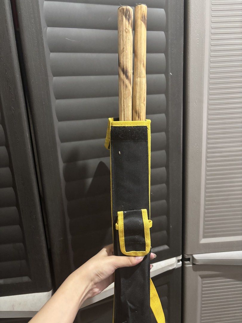 UST arnis (Category: Combat Sports) located in Caloocan City. Submitted by aclyy (Listing ID 1466983687, Image 2). Description: 2 pcs arnis with ust bag mop: qr/maya/maribank mod: lalamove.