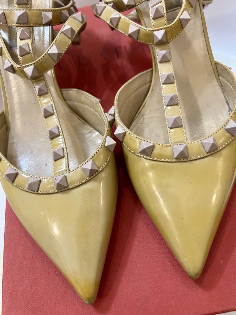 VALENTINO Rockstud Ankle Strap Pump (Category: Sneakers & Footwear) located in Quezon City. Submitted by yassismom (Listing ID 1467010412, Image 3). Description: 8/10 condition, used around 5x sz US 8/EU 39, made in Italy 2 inch-heels caramel/beige color, patent leather includes box, cards and extra rubber sole rubber sole needs replacement (mura lang yan sa Mr. Quickie) bought for 60K+ before manage your expectation, this is a used item .